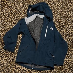 The North Face girls size 7/8  Navy Raincoat